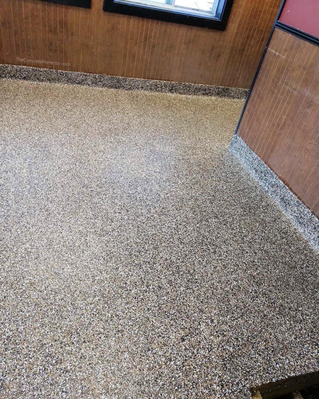 Gray epoxy flake floor close-up