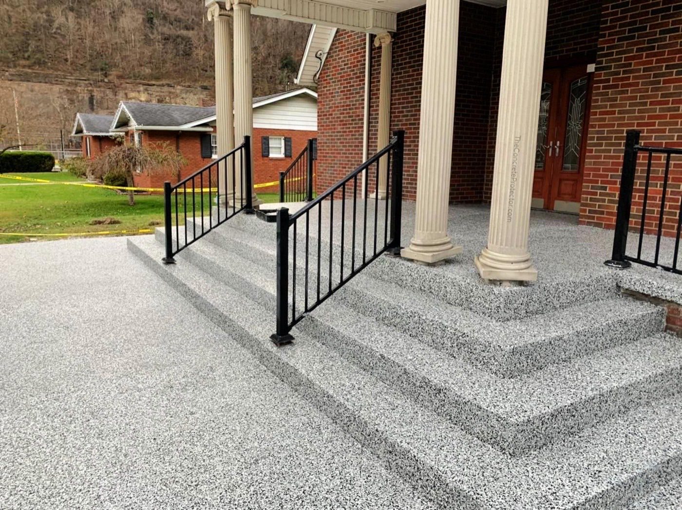 Front stairs with polyaspartic flake coating